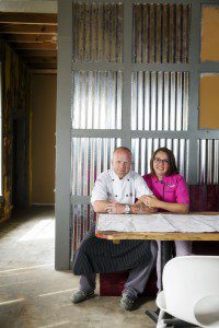 Chef Chris Wadsworth and his wife Summer inside their soon-to-open restaurant Goûter, which also serves as home to Triumph Kitchen. Photo by Collin Richie.