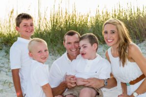Connor Corkern is surrounded by the sweet smiles of family, including brothers Aaron and Cooper, dad Coye and mom Katie, whose passionate support for this legislation led her to write a feature for Huffington Post in April. Katie blogs about her family life at myblessedlittlenest.com.