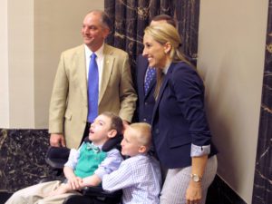 When Governor John Bel Edwards signed Senate Bill 271 into law, medical marijuana advocate Katie Corkern was right beside him with her son Connor, whose frequent seizures may eventually be treated by CBD oil medication.