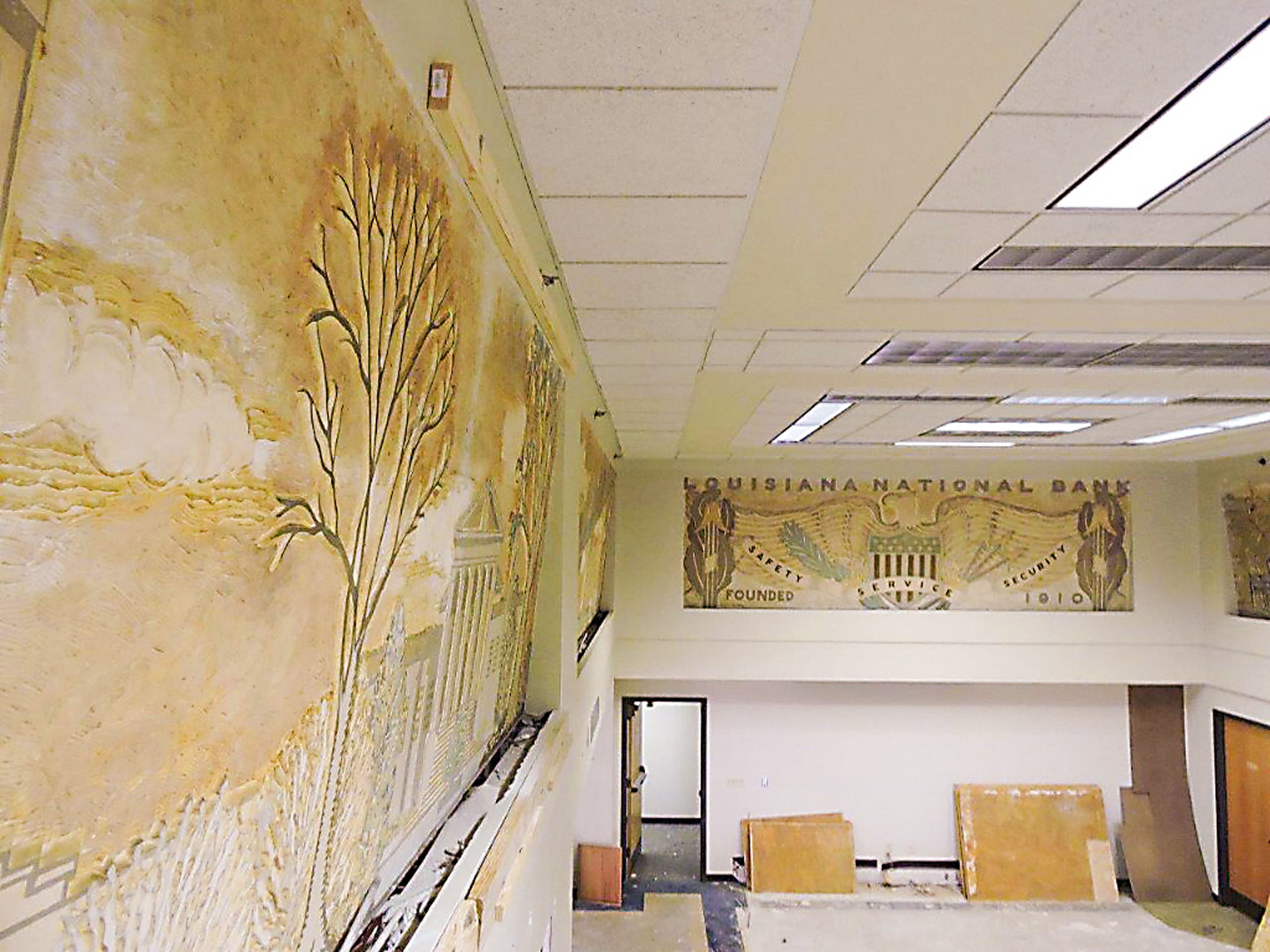 Prior to reconstruction of the building, it was noted that some of the murals had moisture damage and had deteriorated over time. Courtesy Watermark Hotel.