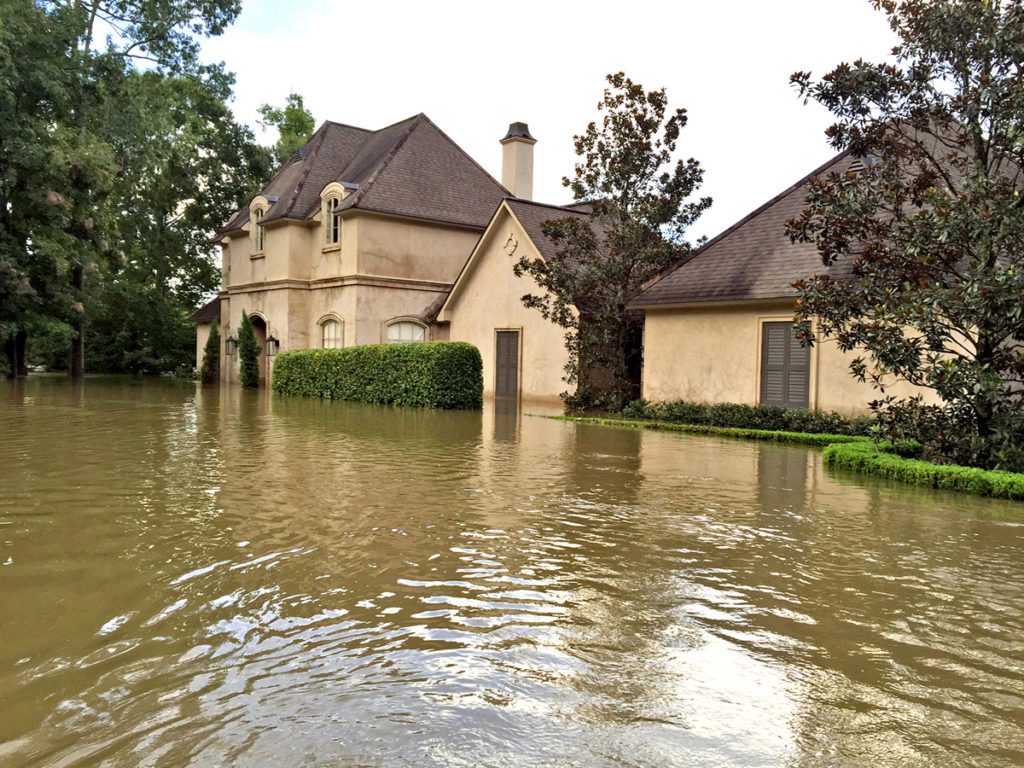 The McIntyre home is the first one past the Jones Creek Bridge entering White Oak Landing neighborhood. While this house took in two feet of water, neighbors’ homes just up the street were spared.