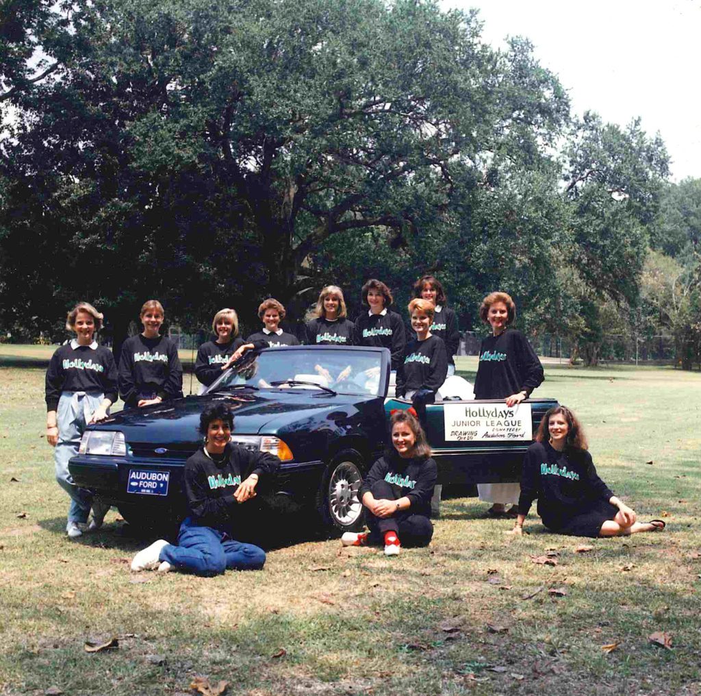 A raffle for a new car has long been an exciting part of the Hollydays fundraising effort, and a photo with the vehicle is a Hollydays committee tradition. Photo by Jeammoe Frey Rhodes.