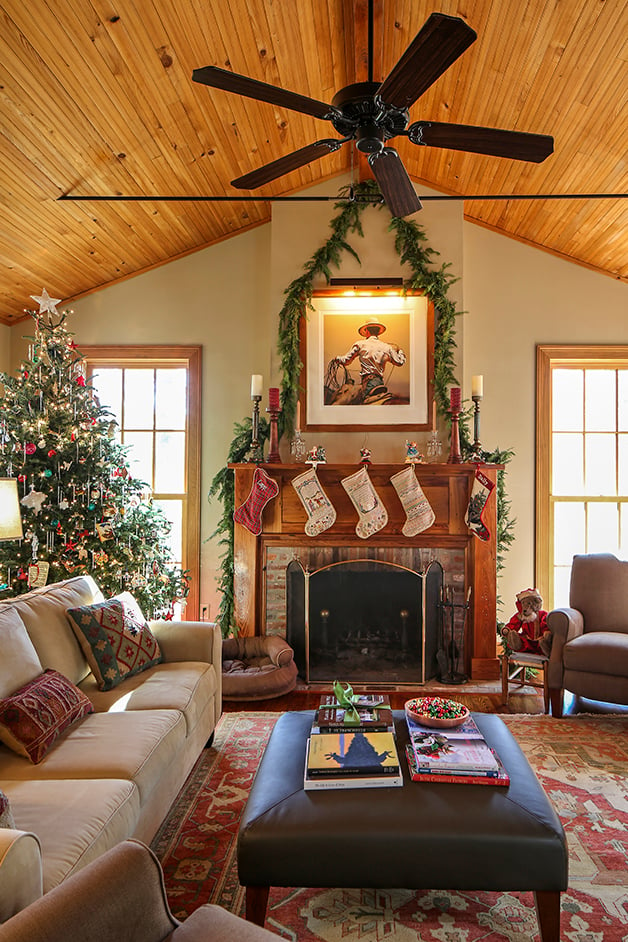 The living room, which features a vaulted ceiling, was added in 2009. This spot is the hub of holiday activities when extended family, including two young grandsons, gather here. Photo by Melissa Oivanka.