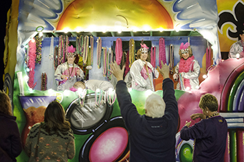 Krewe of Artemis 2016, 1/29/16, Mardi Gras float with people reaching for beads