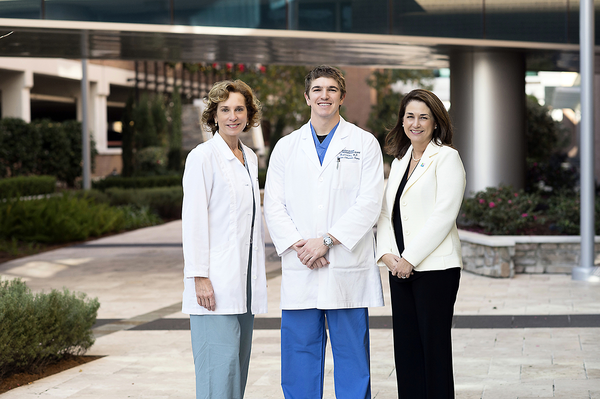 “Everything stops when illness hits,” says Dr. Brad Culotta, a pediatric orthopaedic surgeon at OLOL. “But that’s where OLOL’s Children’s Hospital shines.” Culotta is pictured here with pediatric surgeon Dr. Faith Hansbrough and Dr. Shaun Kemmerly, chief medical officer. These three and many others have been dedicated to expanding pediatric services at OLOL and look forward to the new facilities, which will draw even more specialists.