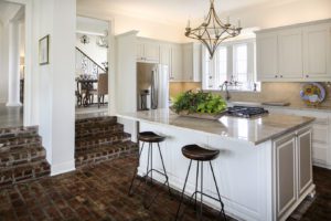 Kitchen to Bath Concepts designer Michelle Livings helped the Ponsons make over their kitchen, a project that included installing a new island and replacing black granite countertops with Taj Mahal quartzite from Michael Paul’s Natural Stone.