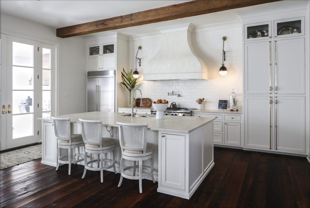 The countertops in this kitchen are natural quartzite with a leathered texture. Photo by Melissa Oivanki.