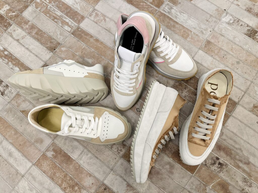 three pairs of neutral sneakers that are essential spring style staples for 2024